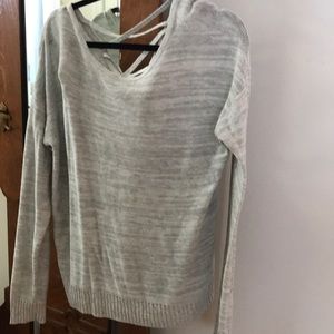 Sweater with cross straps in back